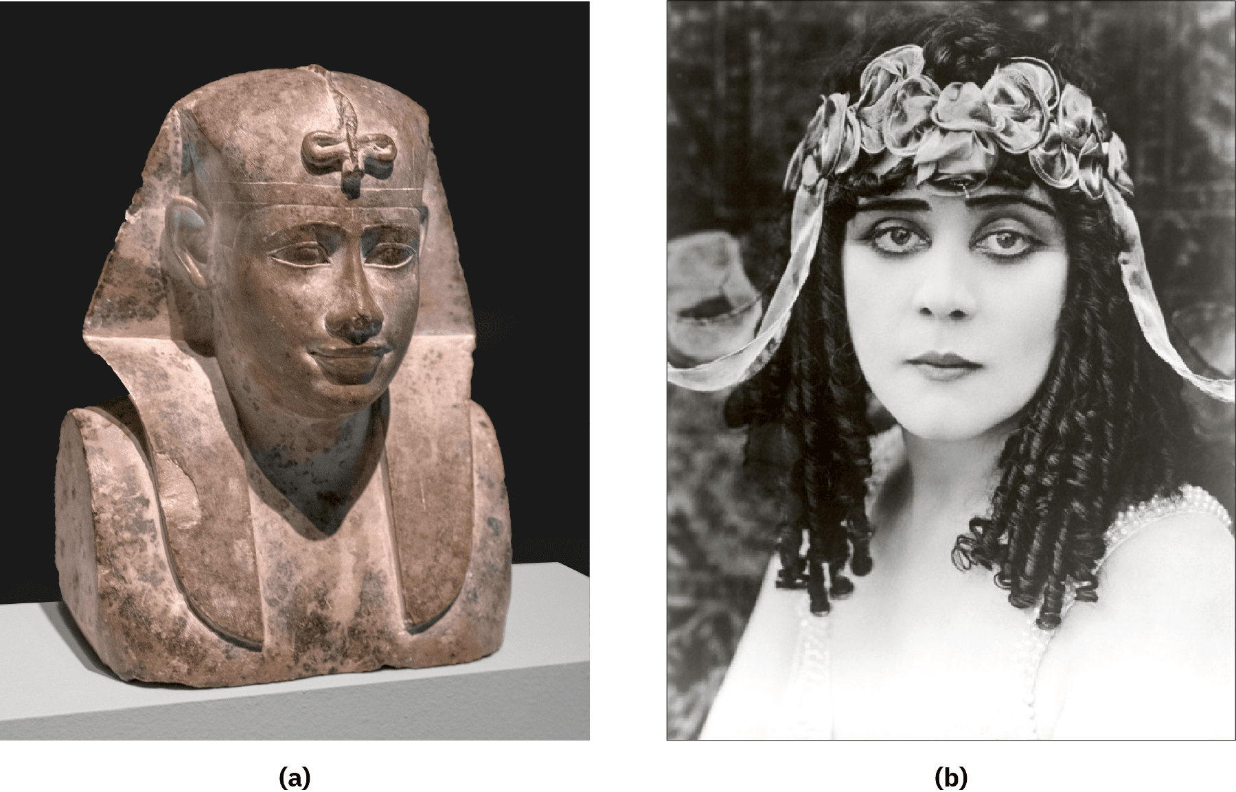 Two photographs of images are shown. (a) This image shows a shiny-brownish stone statue of a bust with almond shaped eyes, a triangular nose and full lips in a smile. The figure wears a plain headdress that goes behind the ears in a triangle and hangs down in the front on their chest. An upside down cross-like knotted figure hangs from the top of the headdress over the forehead. The bust is plain and darker in some areas. (b) A black and white photograph of a woman is shown wearing a bright white shirt that fades into her skin color with beaded straps. She has pale skin, dark round eyes, black straight eyebrows, and long very curly hair. She wears a headband of flowery ribbons around her head with a curved ribbon sticking out on each side. The background is blurry gray colors.