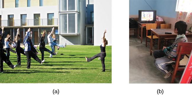 Photograph A shows a yoga instructor demonstrating a yoga pose while a group of students observes her and copies the pose. Photo B shows a child watching television.