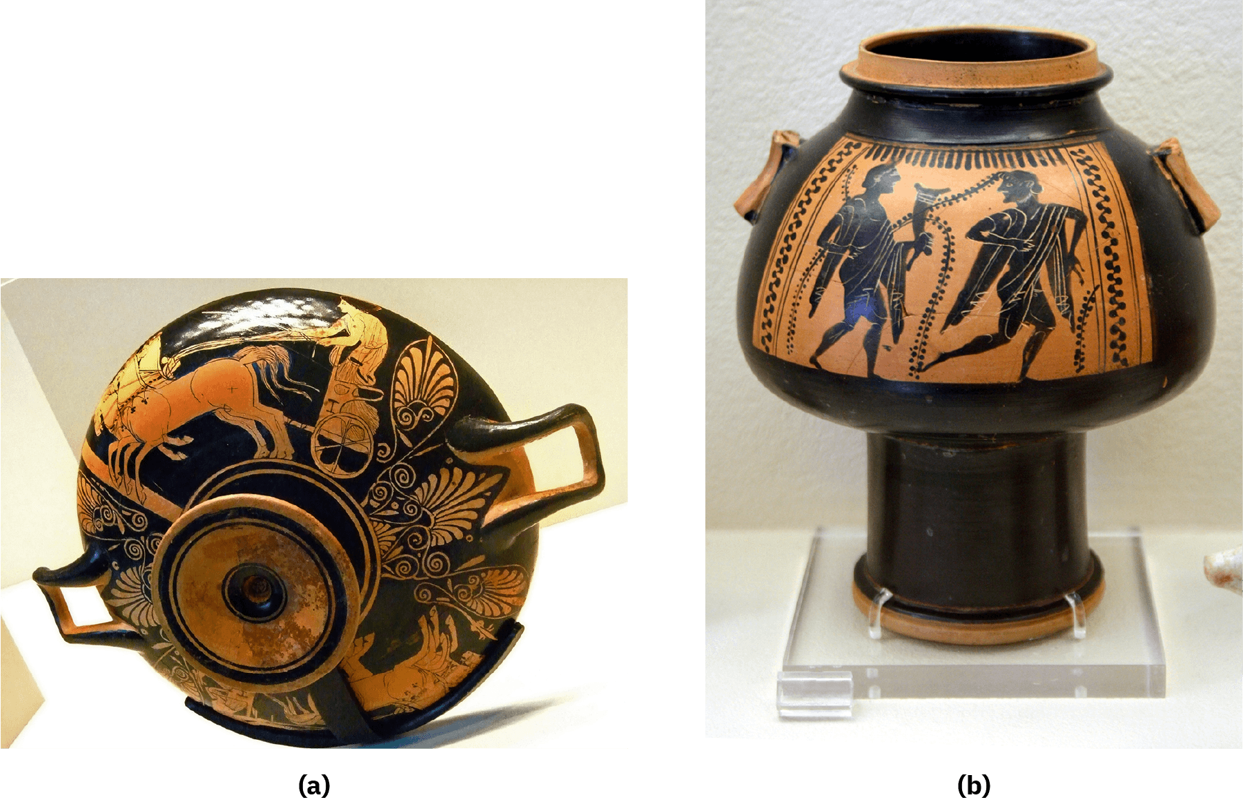 A picture of an ancient cup and a jug are shown. (a) An image of a black and orange cup on its side with the bottom facing forward is shown. The bottom of the cup has orange and black circles and sticks out the bottom of the cup. The outside of the cup is black with an orange scene depicted twice – two horses pulling a standing chariot with a rider holding the reins. In between are designs depicting leaf-like drawings. Two handles are shown, one on each side. (b) A tall black jug is shown with orange drawings on the top. The top is a circular orange-lipped opening with a thicker middle with two orange handles and a thinner tall base. The larger part shows an orange drawing of two figures – both in long cloths and barefoot with muscular legs. The figure on the left holds a cone shaped object in their left hand and the figure on the right appears to be running away. Repetitive circular resigns run along both sides of the drawing and long leafy vines are shown around the figures.